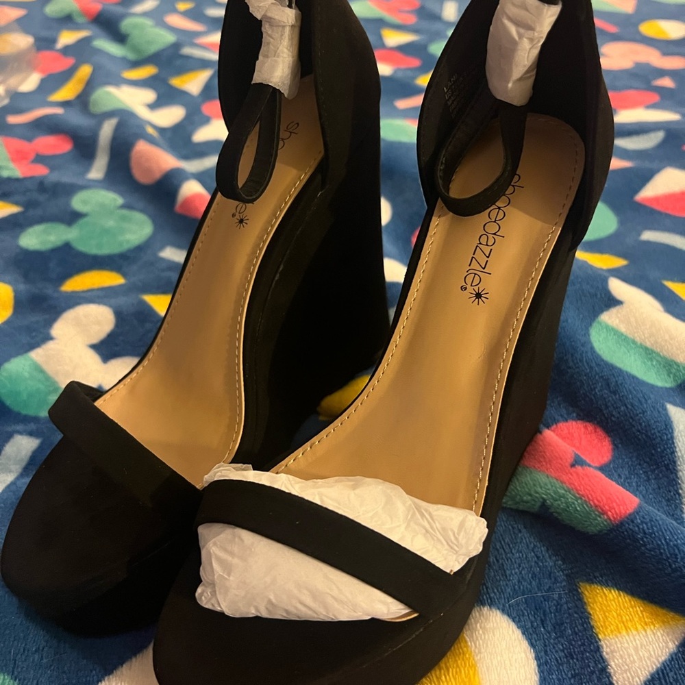 Black suede wedges.